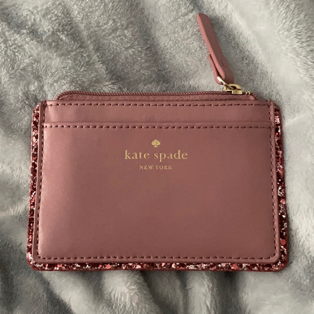 Pink Kate Spade card holder with pink sparkle rim